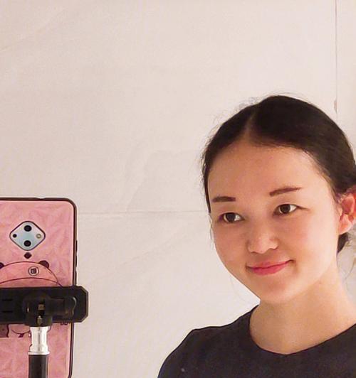 华为手机如何设置握拳自拍功能？