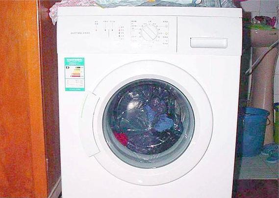 解决滚筒洗衣机机门打不开和工作噪音大的问题（应对洗衣机机门卡住和减少洗衣机噪音的有效方法）